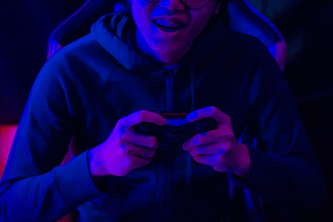 Gamer Playing Videogames in the Dark